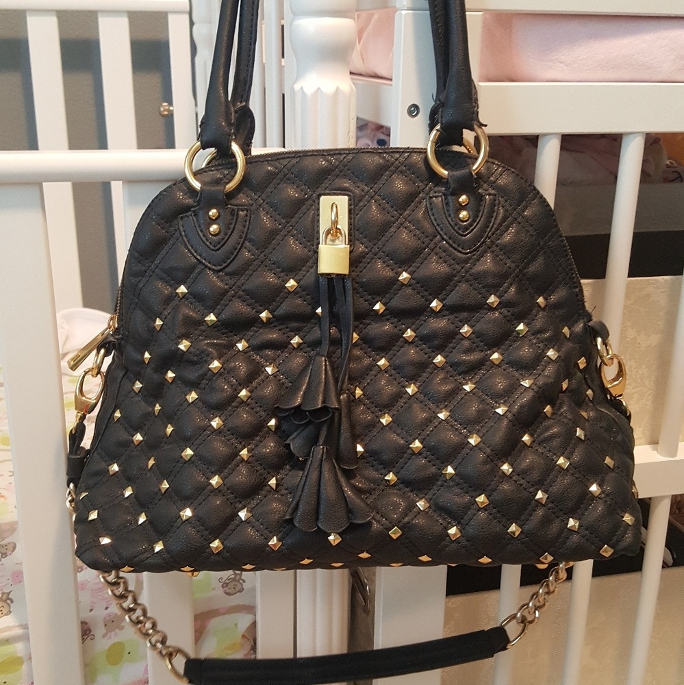 Black faux leather bag with gold accents